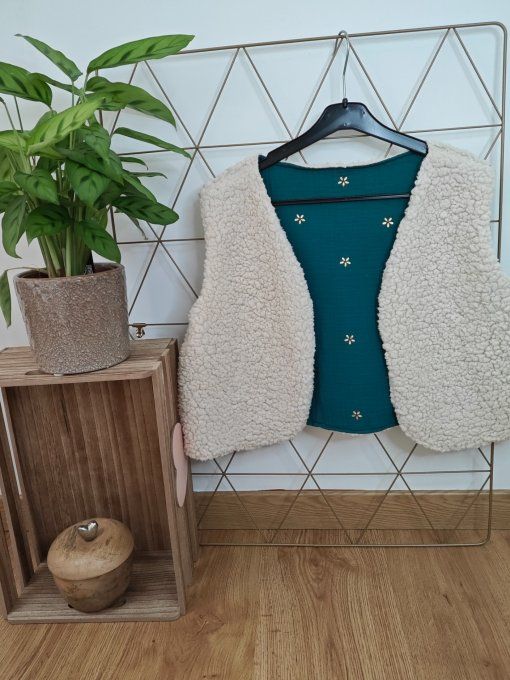 Gilet sans manches réversible  5/6 ans de différents coloris de différents coloris 