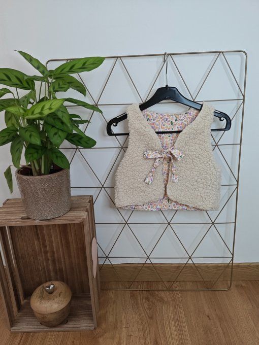 Gilet sans manches  12 mois différents coloris 