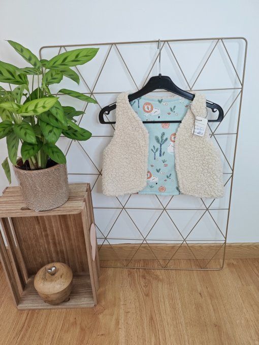 Gilet sans manches  12 mois différents coloris 