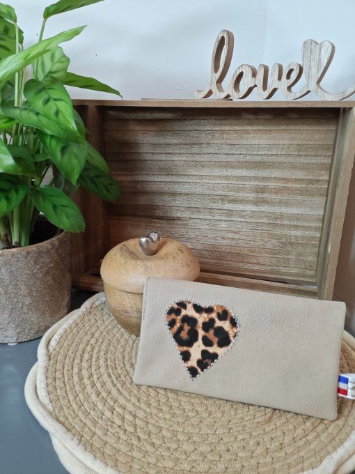 Pochettes chéquier, différents coloris.